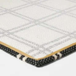 1'6"x2'6" Indoor/Outdoor Plaid Scatter Halloween Doormat Black/White - Hyde & EEK! Boutique™ -EEK! Deals Store GUEST 61fba789 c646 4b6a 8307 45e32a6f8042